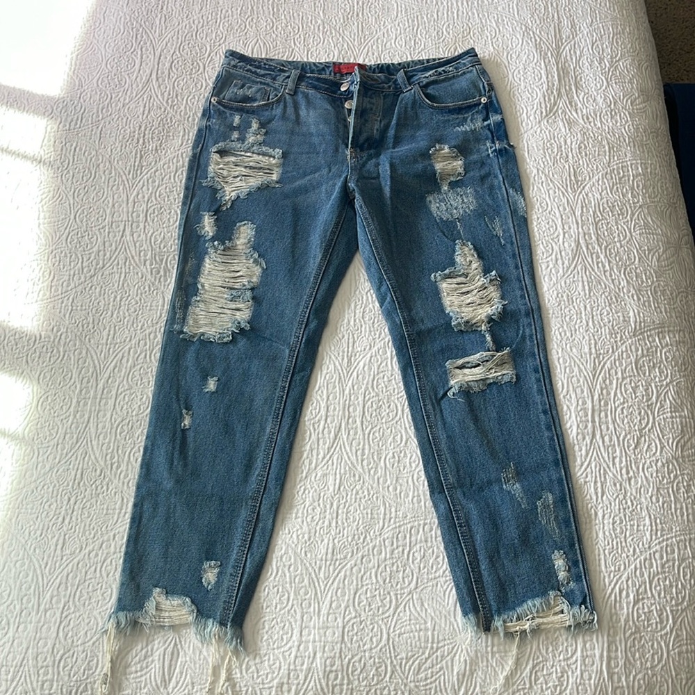 NWT. Signature8 jeans, mid calf, mid rise. Size LARGE. NEVER BEEN WORN